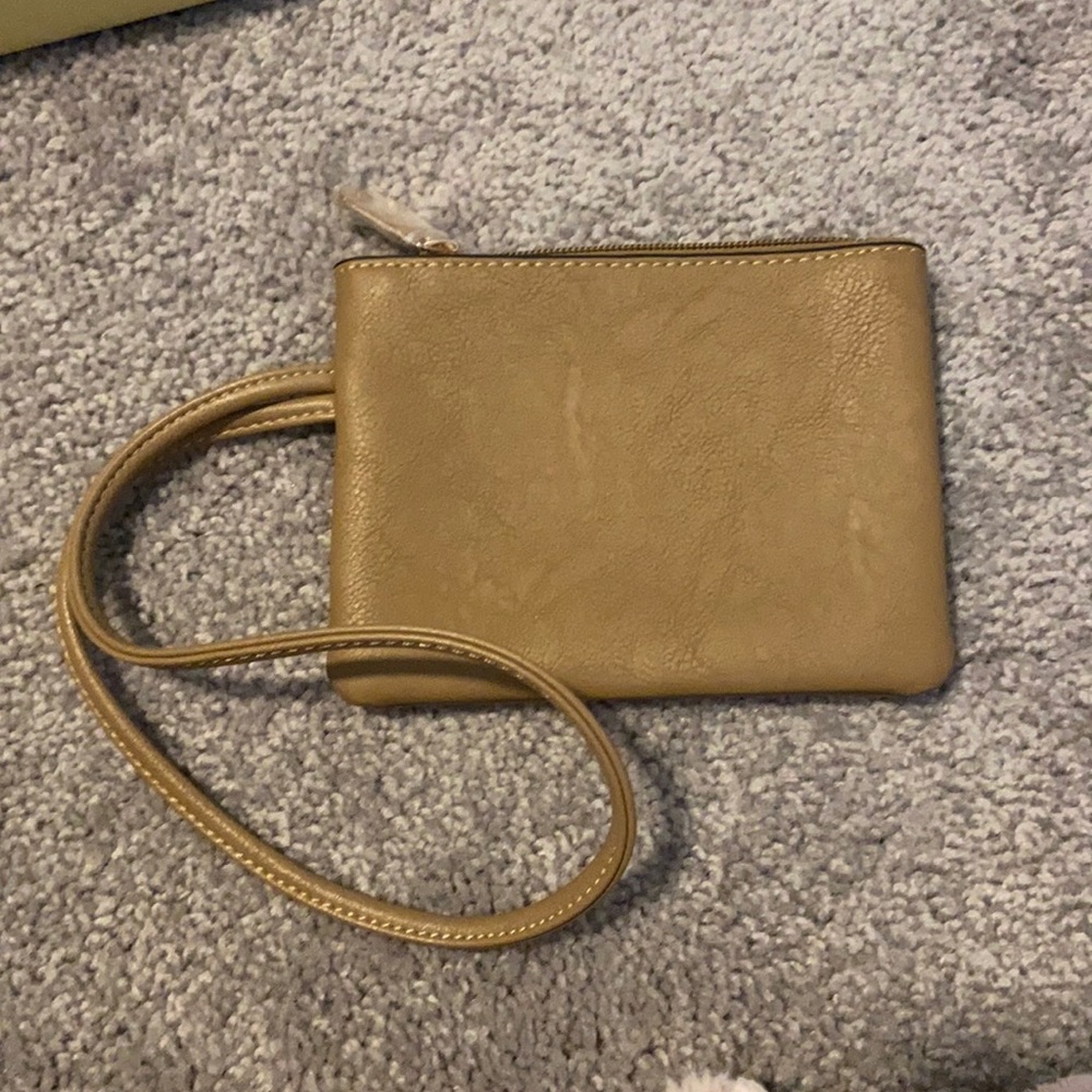 Small brown wristlet bag